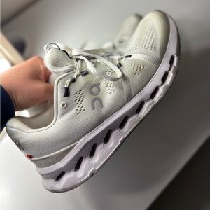 On Running White Sneakers with Wavy Midsole Design